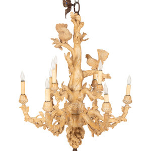 Appraisal: A Carved Fruitwood Ten Light Chandelier th Century Height inches