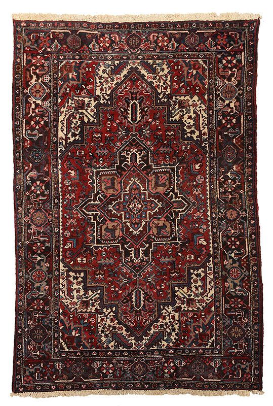 Appraisal: Heriz Carpet th century red field with polygonal medallion white