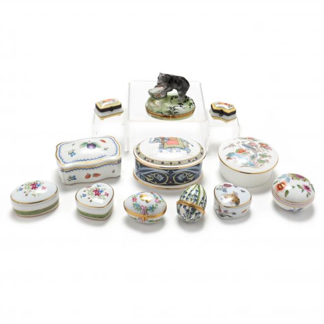 Appraisal: A SELECTION OF TWELVE PORCELAIN PILL BOXES th century are