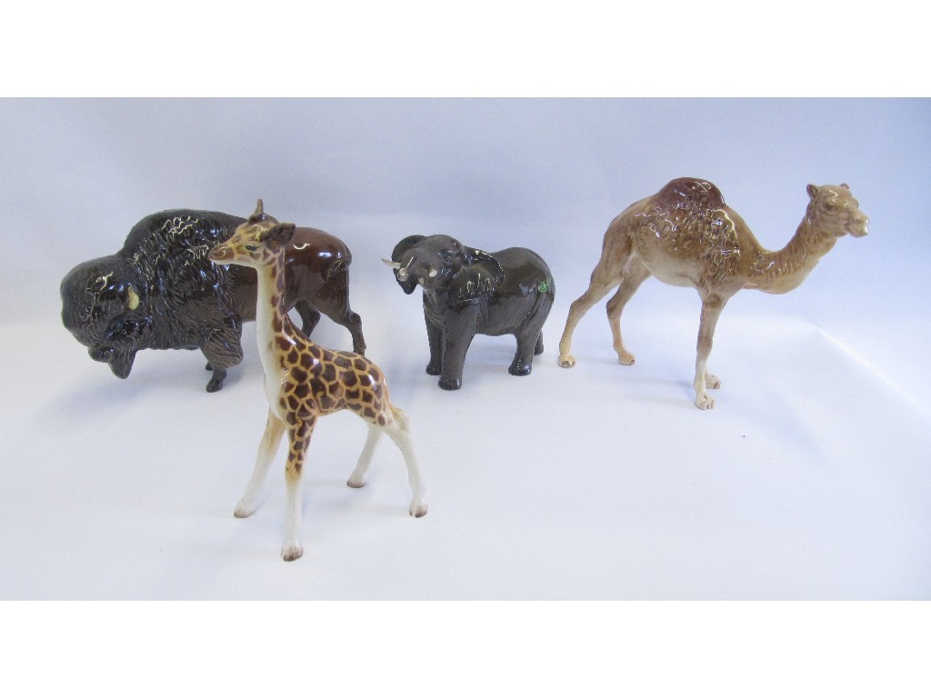 Appraisal: Four Beswick animals including camel small giraffe elephant and bison