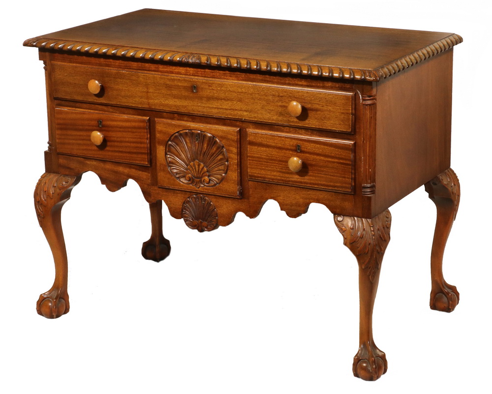 Appraisal: MAHOGANY LOWBOY Circa Chippendale Style Mahogany Lowboy with molded and