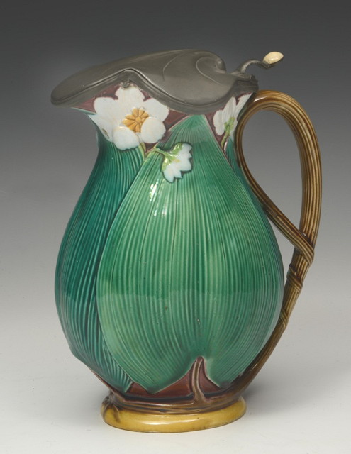 Appraisal: A MINTON MAJOLICA POTTERY BALUSTER JUG with pewter handle and