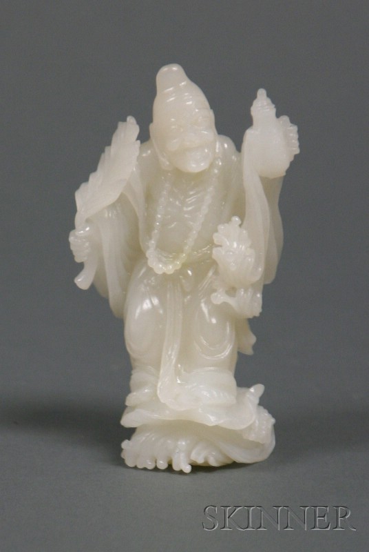 Appraisal: Jade Carving China th century pure white stone figure of