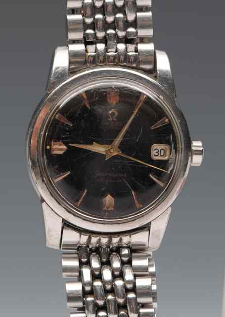 Appraisal: AN OMEGA SEAMASTER AUTOMATIC WRIST WATCH the black dial and