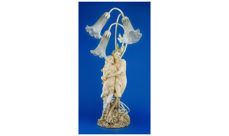 Appraisal: A Table Lamp with Male and Female Figures The figures