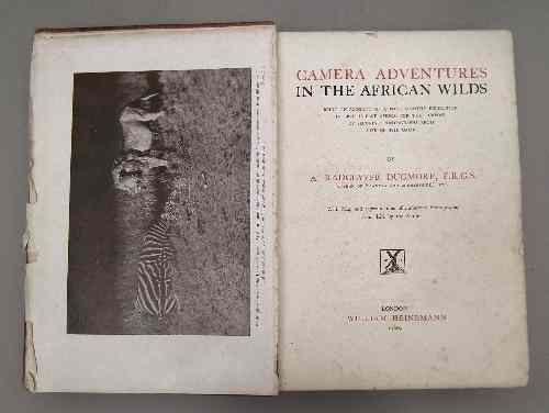 Appraisal: A Radclyffe Dugmore - Two copies - ''Camera Adventures in