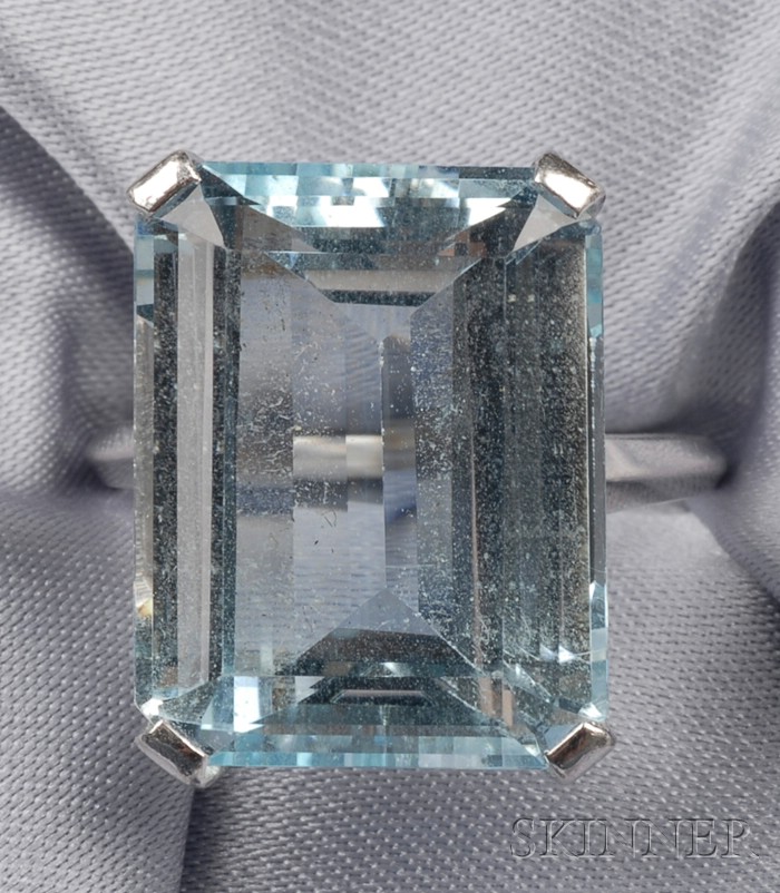 Appraisal: Platinum and Aquamarine Ring set with an emerald-cut aquamarine measuring