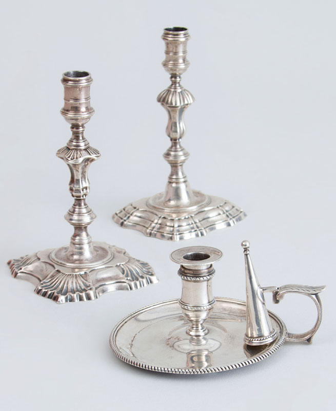 Appraisal: TWO SIMILAR GEORGE II CRESTED SILVER TAPER CANDLESTICKS AND A