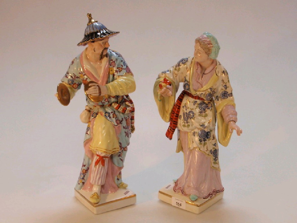 Appraisal: A pair of Continental porcelain figures of a European female