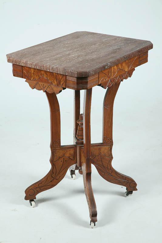 Appraisal: VICTORIAN LAMP TABLE Walnut Eastlake style table with brown mottled