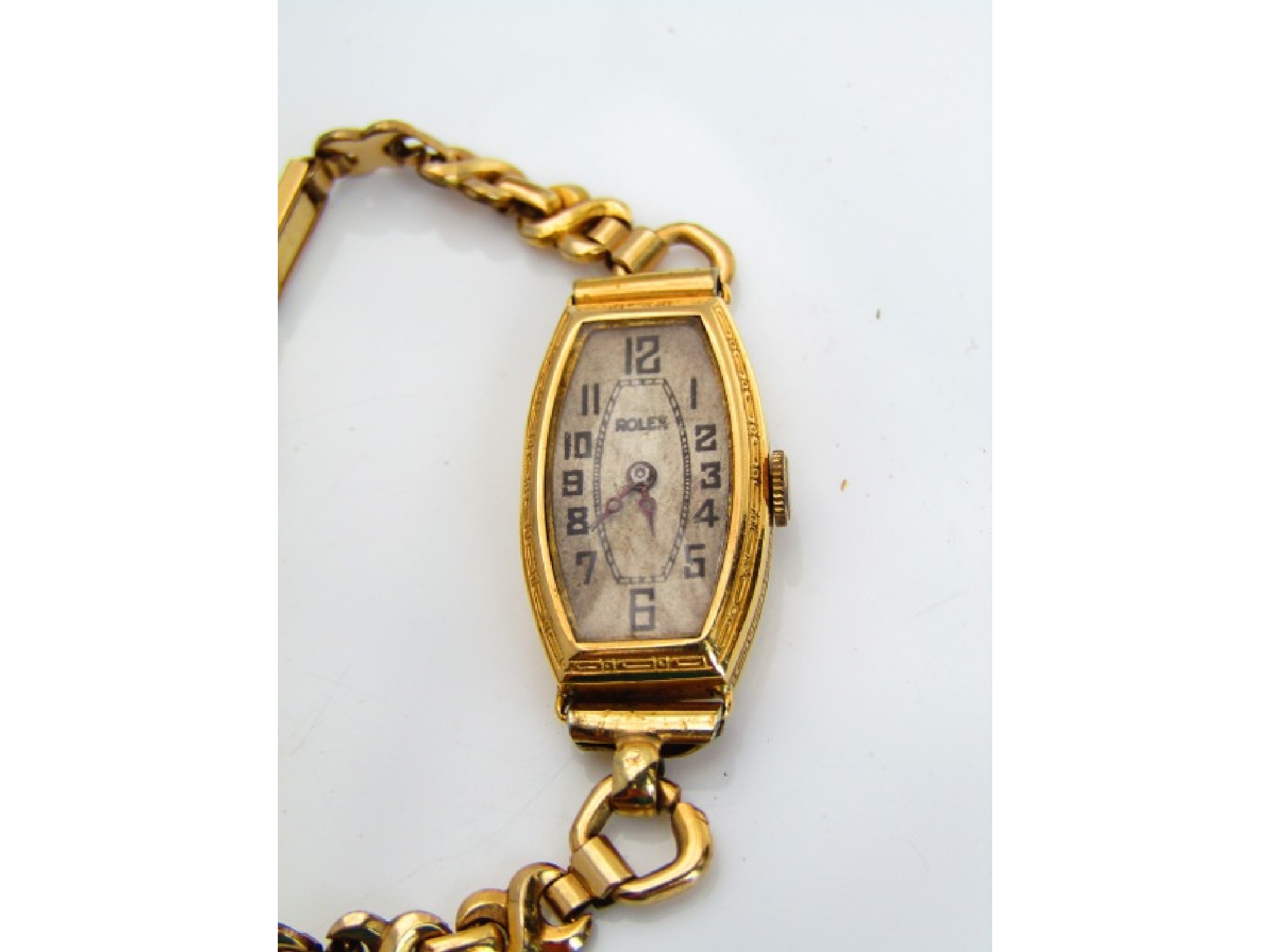 Appraisal: A lady's ct gold wristwatch Rolex circa 's the tonneau