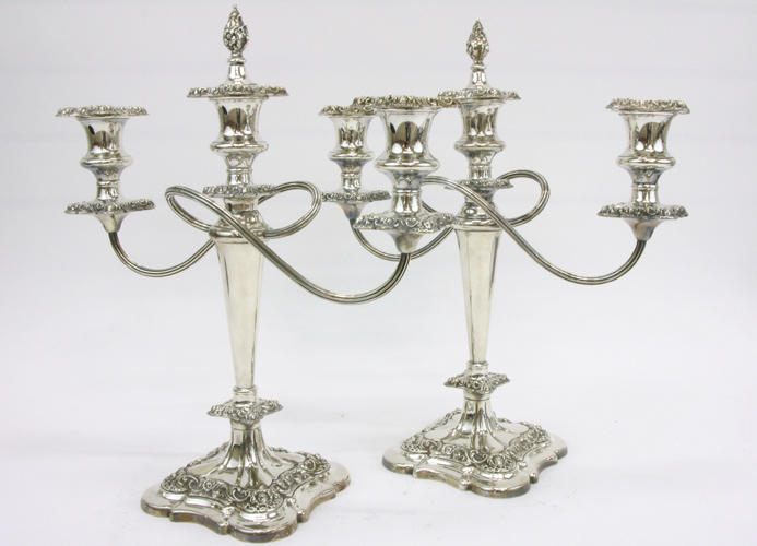 Appraisal: PAIR ENGLISH ORNATE SILVER PLATED CANDELABRA -light fitted with wax