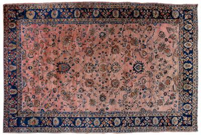 Appraisal: Sarouk rug repeating floral design on pale salmon field dark