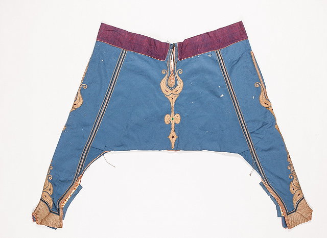 Appraisal: A PAIR OF MIDDLE EASTERN BLUE BROADCLOTH MILITARY TROUSERS with