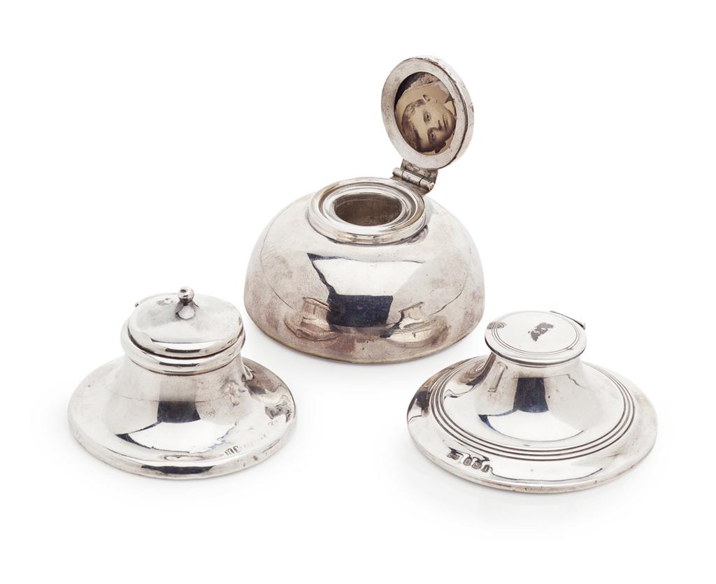 Appraisal: A group of three silver table inkwells circa each of