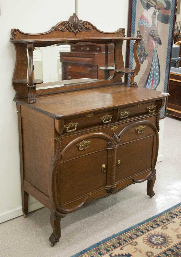 Appraisal: OAK SIDEBOARD American c a -door -drawer buffet base with