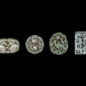 Appraisal: Four Chinese Celadon Jade Carved and Reticulated Pendants depicting cranes