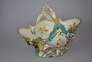 Appraisal: A Coalport th century rococo style basket painted with sprays