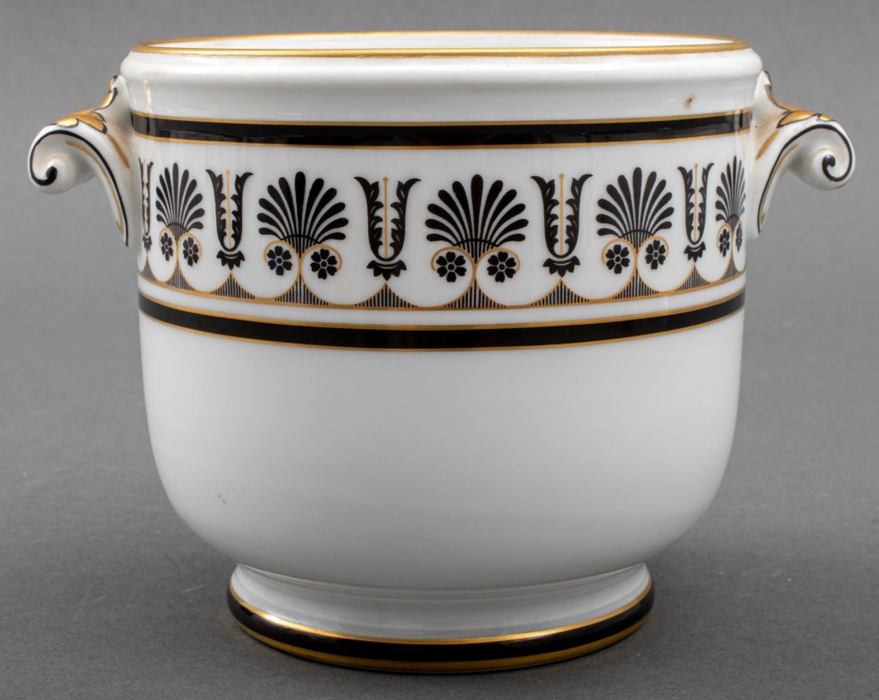 Appraisal: GINORI BLACK-PAINTED PARCEL GILT CACHEPOT C Italian Neoclassical style Ginori