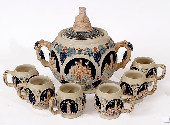 Appraisal: Stein Type Hot Cider Set The vessel has different castles