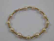 Appraisal: A yellow metal tests ct gold and cultured pearl bracelet