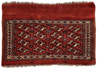 Appraisal: Finely woven Turkomen rug rows of boteh on burgundy ground