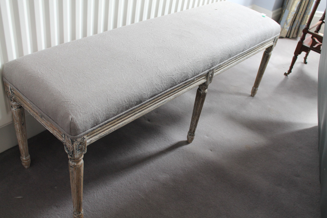 Appraisal: A reproduction Louis XVI limed and painted oak window seat