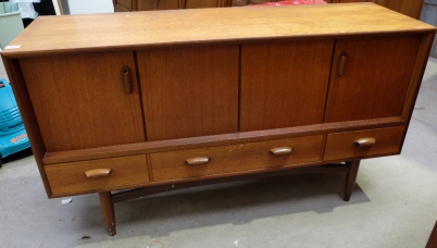 Appraisal: s Teak four door sideboard