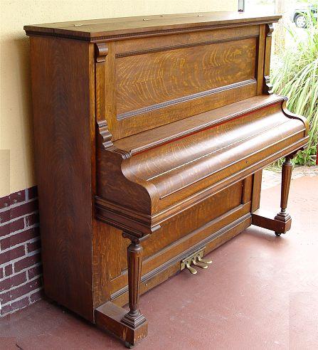 Appraisal: RICHMOND PIANO CO TIGER OAK UPRIGHT PIANO Manufactured by The