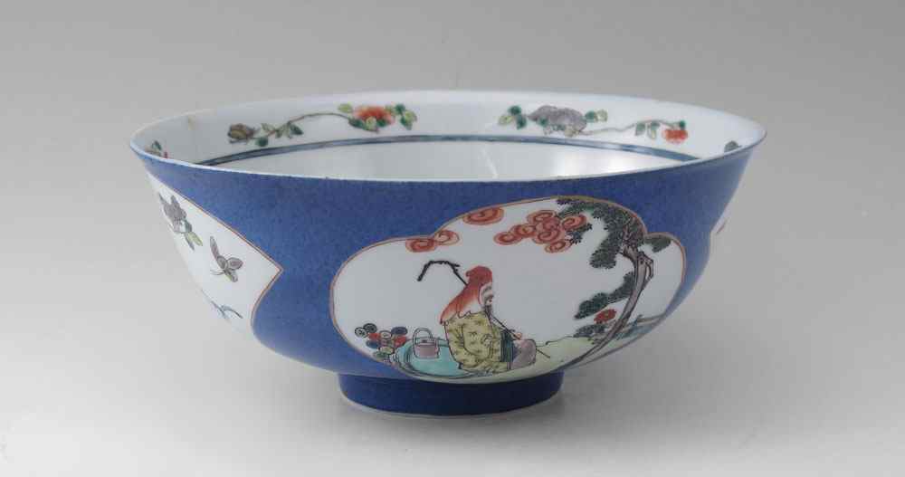 Appraisal: CHINESE EXPORT DEEP BOWL Blue ground with scenic reserves with