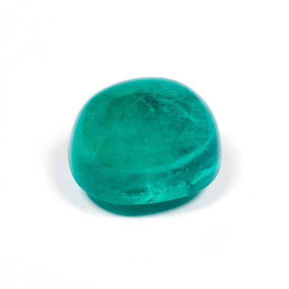 Appraisal: UNMOUNTED EMERALD Unmounted oval fine Columbian emerald cabochon of ct