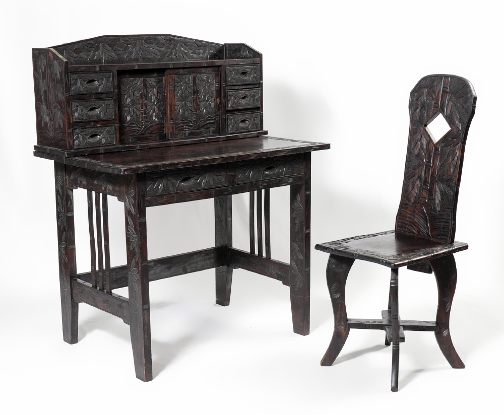 Appraisal: CARVED VIETNAMESE DESK AND CHAIR Carved with bamboo motif all