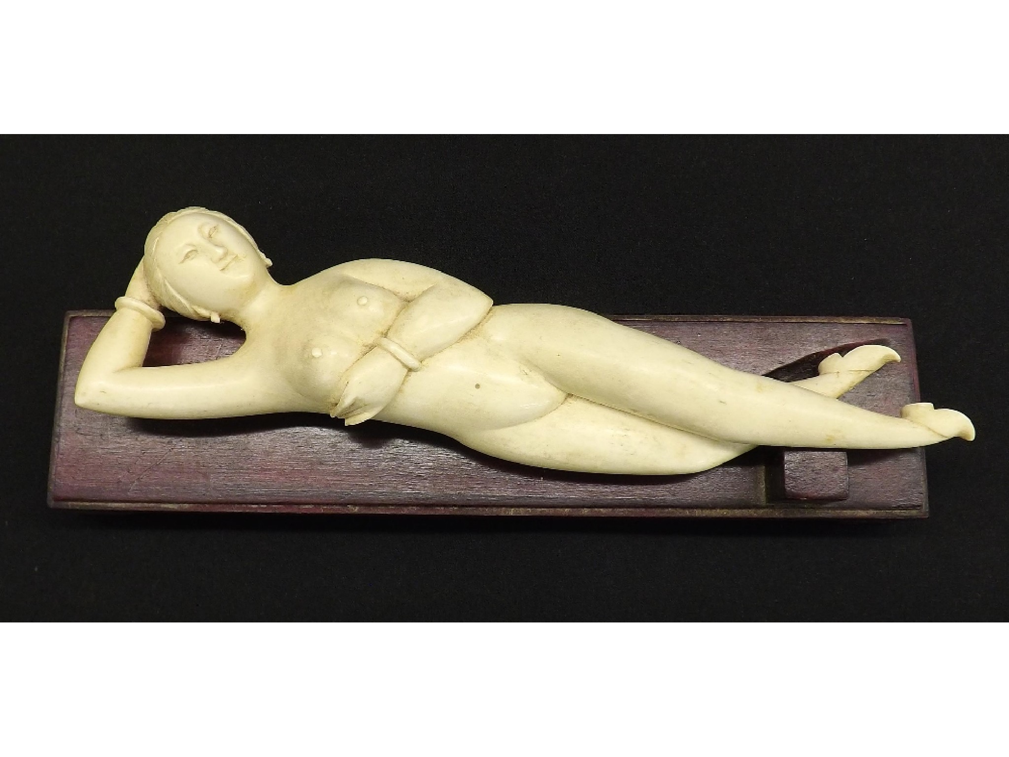 Appraisal: Rare medical carved ivory figure of a nude lady upon