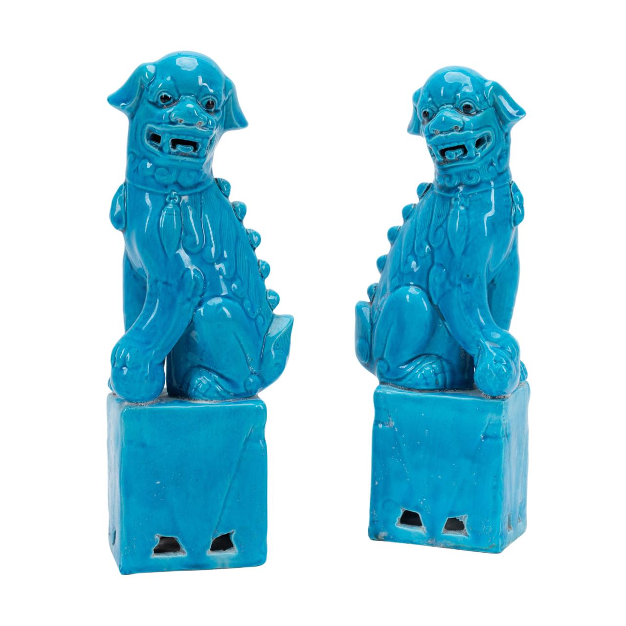 Appraisal: PAIR OF CHINESE TURQUOISE GLAZED OPPOSING FU LIONS Pair of