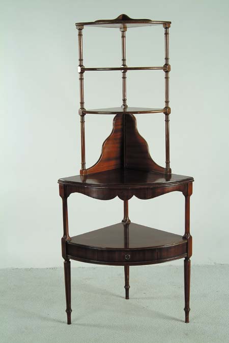 Appraisal: MAHOGANY CORNER CURIO STAND Stepback design having five tiers Bottom