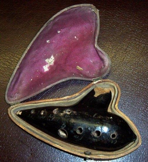 Appraisal: An ocarina stamped Brevetes France cm long in original case