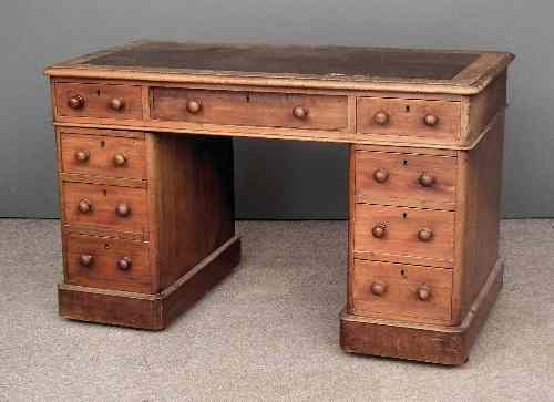 Appraisal: A Victorian mahogany kneehole desk by P Penn Co Dover