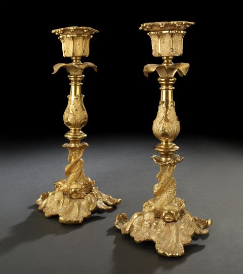 Appraisal: Pair of English Gilt-Lacquered Brass Triple Dolphin Candlesticks third quarter