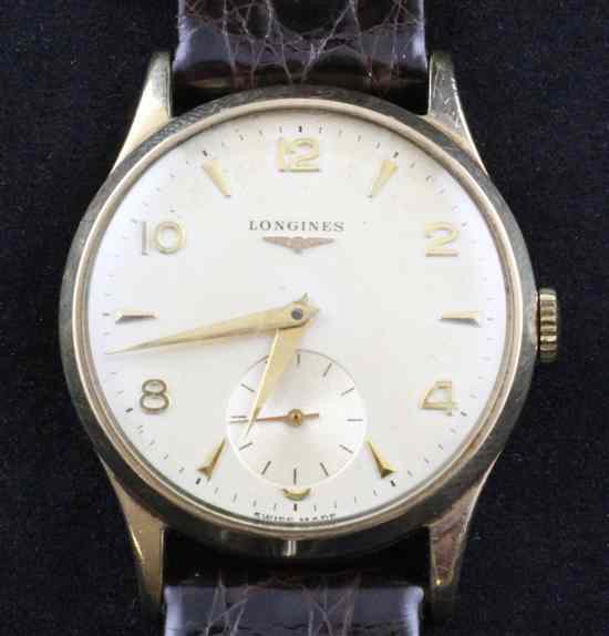 Appraisal: A gentleman's ct gold Longines wrist watch with baton markers