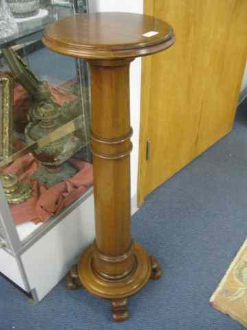 Appraisal: Mahogany Plant Stand column decor footed '' tall '' diameter