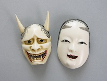 Appraisal: Pair of Miniature Japanese Ivory Masks circa mid th Century