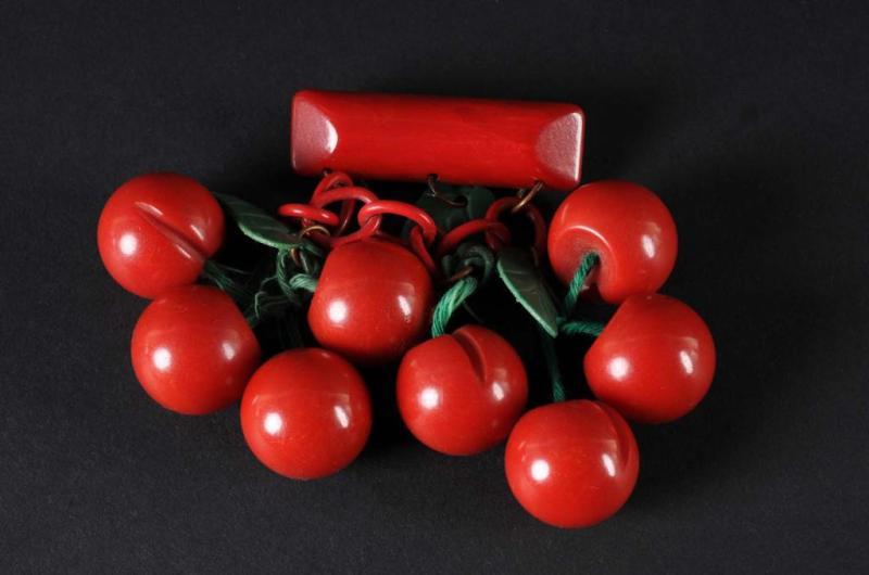 Appraisal: Bakelite Hanging Cherries Pin Description Eight red cherries and five