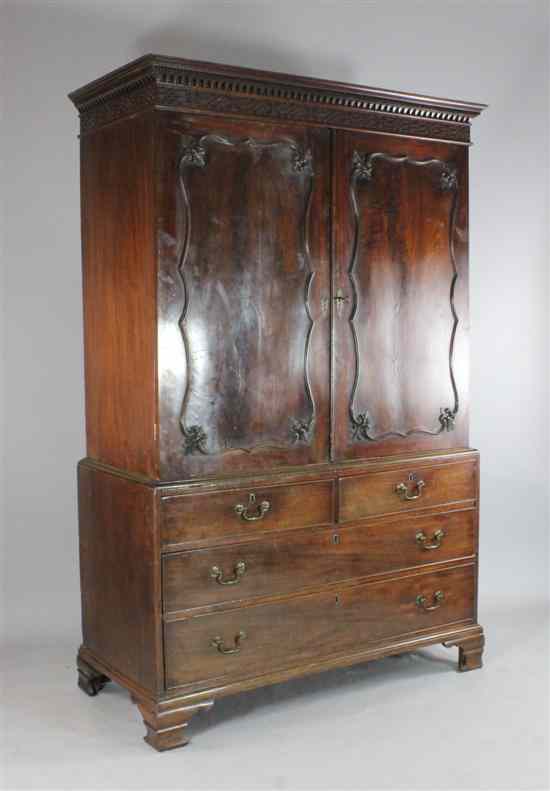 Appraisal: A George III mahogany linen press converted for hanging on