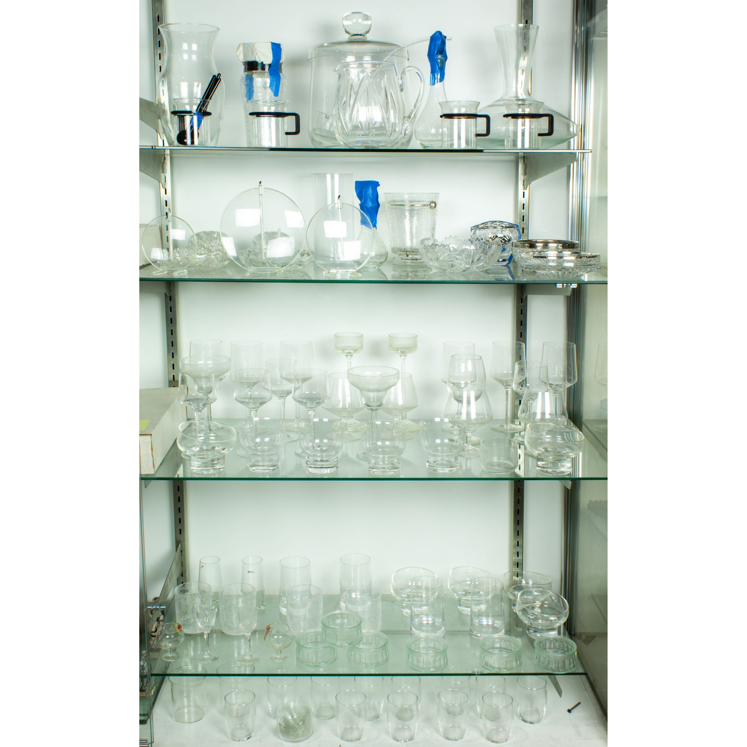 Appraisal: FIVE SHELVES OF GLASSWARE Five shelves of glassware including Bodum