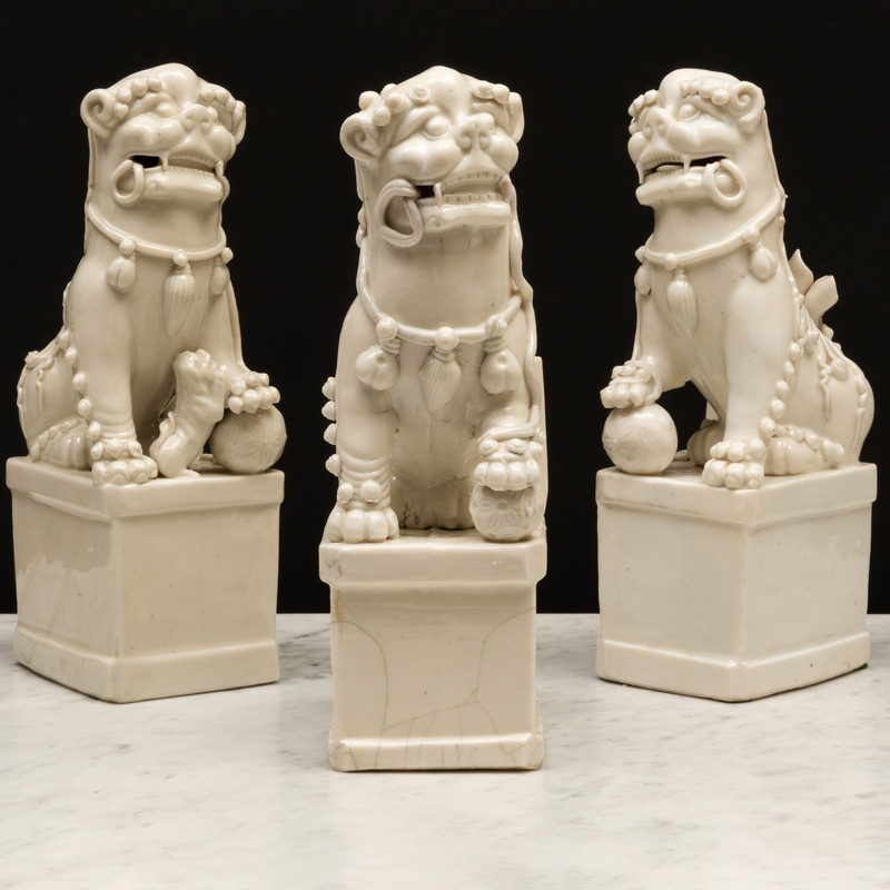 Appraisal: Group of Three Blanc de Chine Porcelain Buddhistic Lion Joss