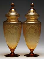 Appraisal: PAIR OF SINCLAIR COVERED VASES Amber colored vases with an