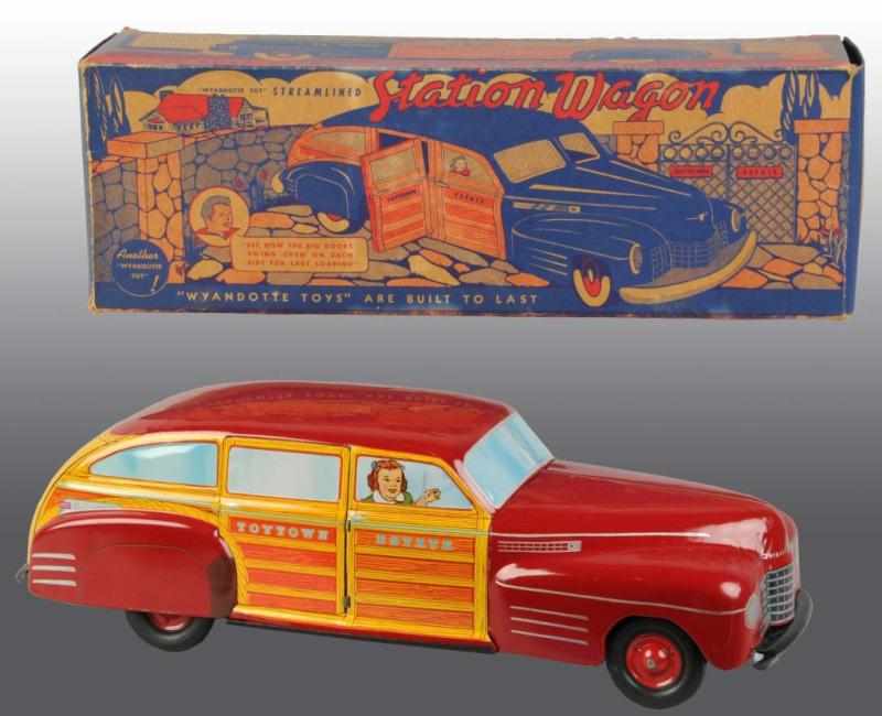 Appraisal: Wyandotte Pressed Steel Station Wagon Toy Description Circa 's Includes