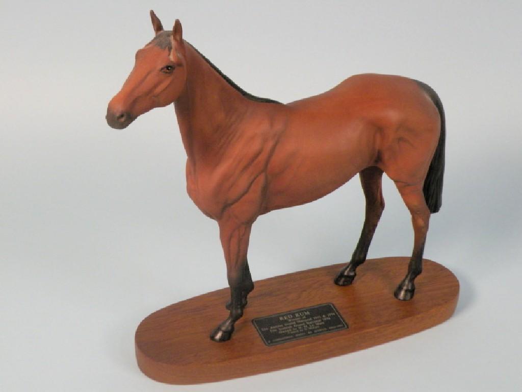 Appraisal: A Beswick connoisseur model of Red Rum on a mahogany