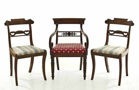 Appraisal: Classical mahogany chairs circa armchair with scroll crest over horizontal