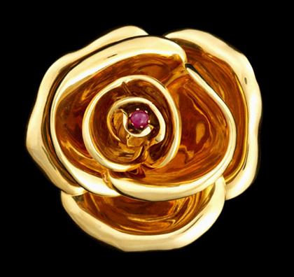 Appraisal: Lady's karat yellow gold rose brooch Nine delicately molded petals